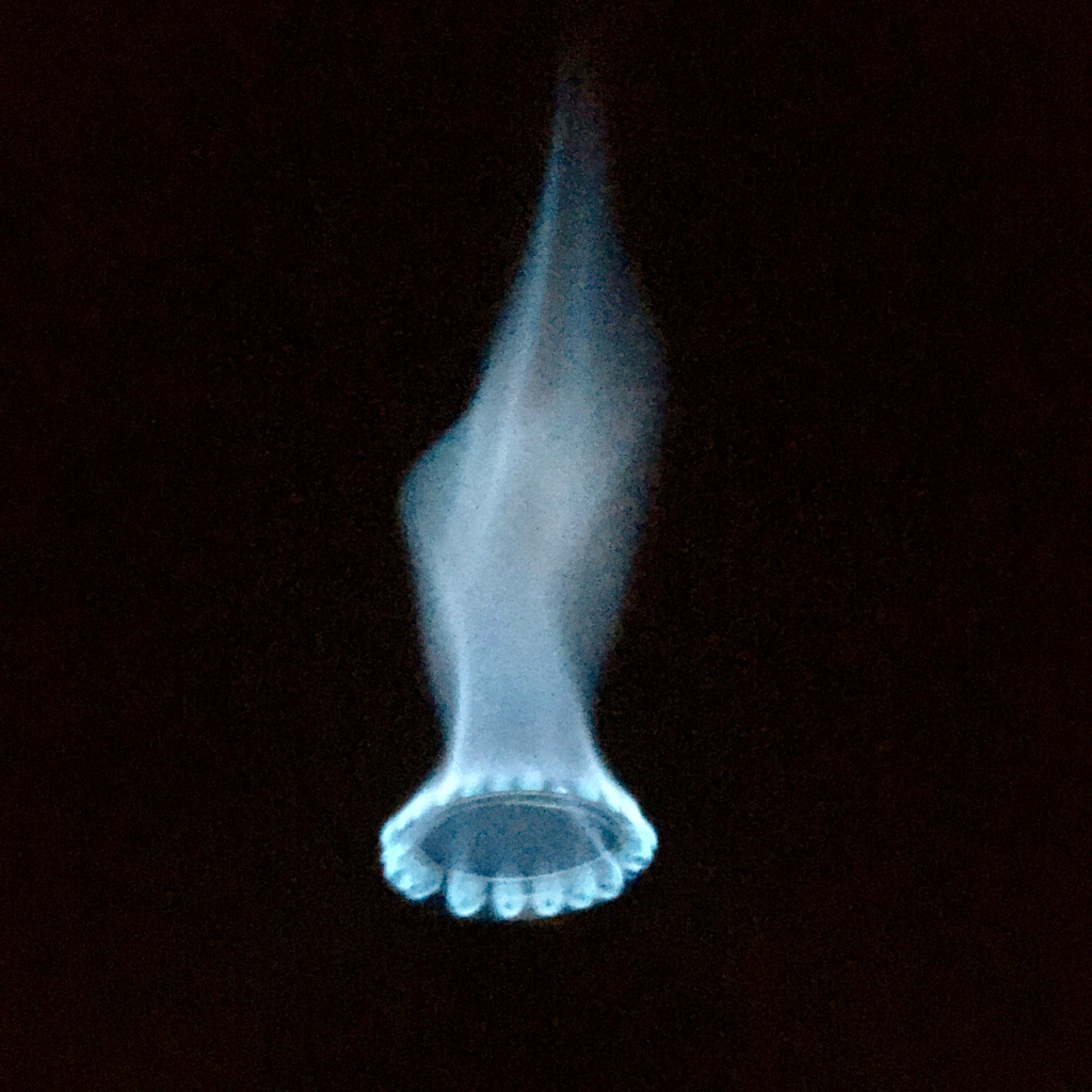High, blue flame from a DIY denatured alcohol stove.