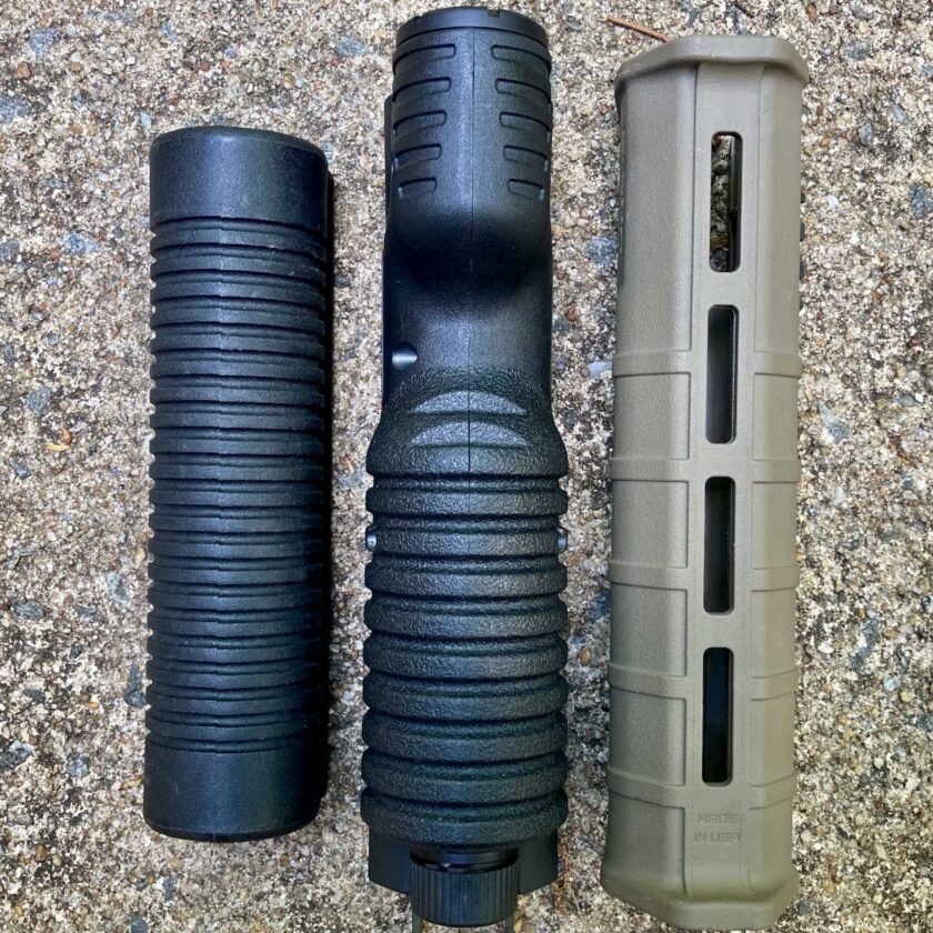 The TL-Racker shotgun light flanked by two other forends.