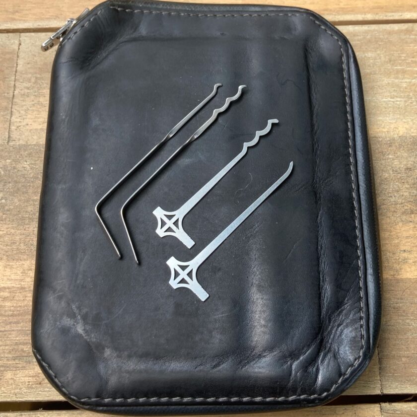 This is my wallet lockpick set. The three on the left are homemade, any  thing else I should include? : r/lockpicking